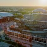 Aerial view of Baseball Stadiums in Arlington, Texas at sunset—ideal locations for Arlington DMC corporate events and group experiences.